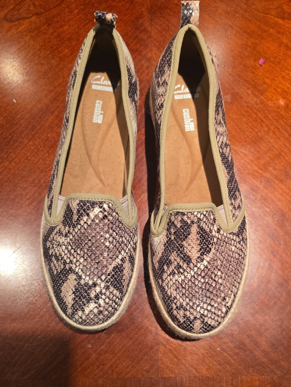 Clarks Women's Snake-Print Slip-Ons in Brown and Tan